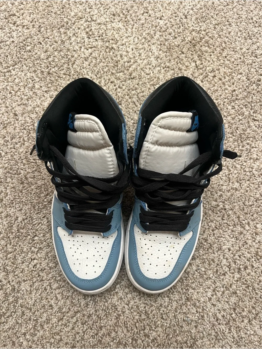 Authentic Jordan 1 Retro High OG in University Blue/White with Black Swoosh